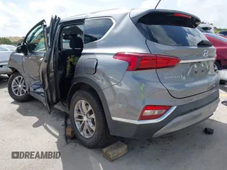 2019 Hyundai Santa Fe SE with VIN 5NMS23AD2KH108936, listed as a IAAI auction lot 42626196 with 72,757 mi miles and . Bid and sale history available at DreamBid. Image 3.