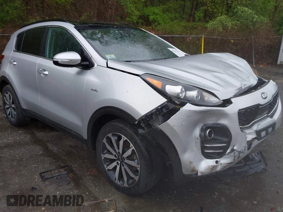 2018 Kia Sportage EX z VIN KNDPNCAC8J7309766, wystawiony jako IAAI lot #42219243 z przebiegiem 90 745 mil mil oraz . Historia ofert i sprzedaży dostępna na DreamBid. Obrazek 1.
