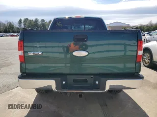 2007 Ford F-150 STX with VIN 1FTRX14W57FB39989, listed as a Copart auction lot 50695635 with 252,852 mi miles and Salvage title. Bid and sale history available at DreamBid. Image 6.