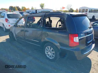 2014 Chrysler Town & Country Touring with VIN 2C4RC1BGXER112283, listed as a IAAI auction lot 40593456 with Not Provided miles and . Bid and sale history available at DreamBid. Image 3.