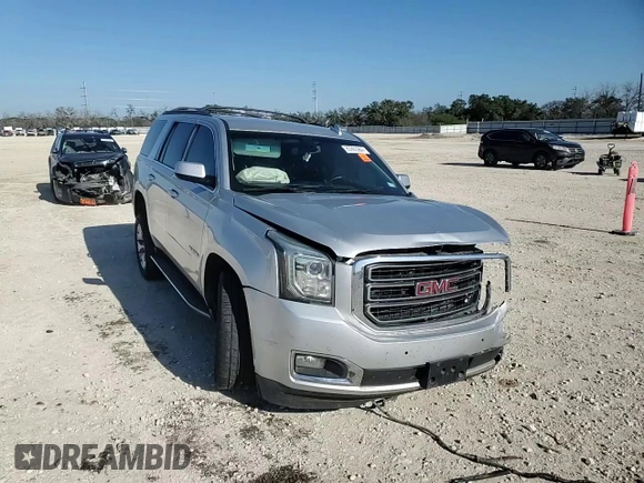 2015 GMC Yukon SLE with VIN 1GKS1AKC1FR716322, listed as a Copart auction lot 85992964 with 141,552 mi miles and Salvage Title. Bid and sale history available at carsss.com. Image 12.