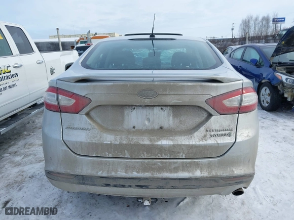2014 Ford Fusion Titanium Hybrid with VIN 3FA6P0RU1ER291455, listed as a IAAI auction lot 41821152 with 108,408 mi miles. Bid and sale history available at carsss.com. Image 16.