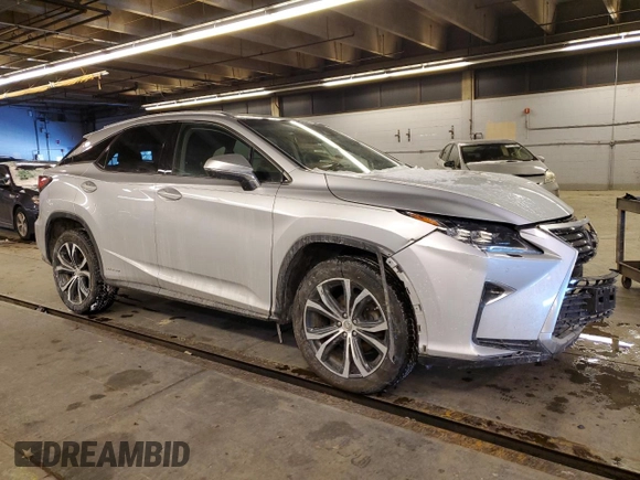 2016 Lexus RX 450h with VIN 2T2BGMCA2GC001405, listed as a Copart auction lot 45579795 with 129,086 mi miles and Salvage title. Bid and sale history available at DreamBid. Image 4.