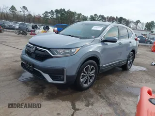 2021 Honda CR-V EX with VIN 2HKRW2H57MH618300, listed as a IAAI auction lot 41824198 with 134,892 mi miles. Bid and sale history available at carsss.com. Image 2.