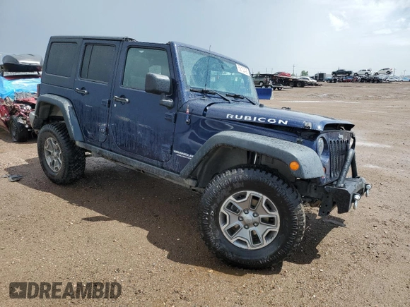 2013 Jeep Wrangler Unlimited Rubicon with VIN 1C4BJWFG5DL572795, listed as a Copart auction lot 62132425 with 149,695 mi miles and Salvage title. Bid and sale history available at DreamBid. Image 4.