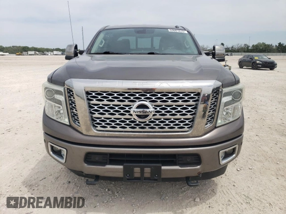 2016 Nissan Titan Platinum Reserve z VIN 1N6BA1F27GN507136, wystawiony jako Copart lot #53681615 z przebiegiem 155 101 mil mil oraz Czysty tytuł • Clean title. Historia ofert i sprzedaży dostępna na DreamBid. Obrazek 5.