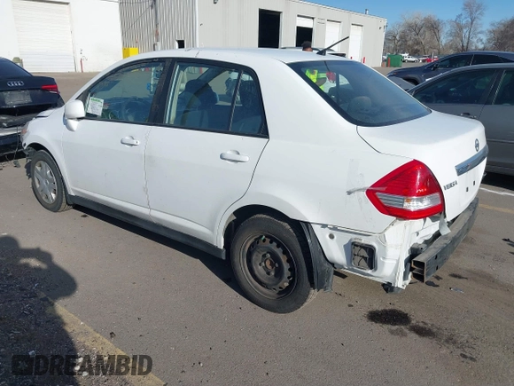 2010 Nissan Versa 1.8 S with VIN 3N1BC1AP8AL465537, listed as a IAAI auction lot 41762115 with 163,533 mi miles and . Bid and sale history available at carsss.com. Image 3.