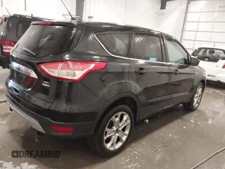 2013 Ford Escape SEL with VIN 1FMCU9H99DUD11347, listed as a IAAI auction lot 41758824 with 154,339 mi miles. Bid and sale history available at carsss.com. Image 4.