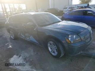 2005 Dodge Magnum RT z VIN 2D4GV58295H549141, wystawiony jako Copart lot #76452934 z przebiegiem 194 588 mil mil oraz Szkoda całkowita • Salvage title. Historia ofert i sprzedaży dostępna na DreamBid. Obrazek 4.