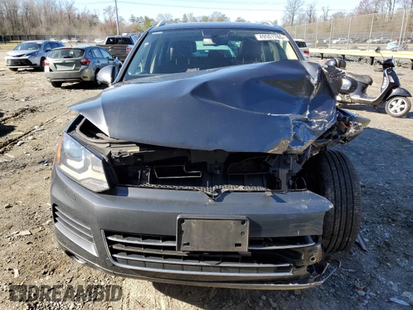 2012 Volkswagen Touareg Lux с VIN WVGEK9BP1CD008132, выставлен на аукционе Copart как лот 49501765 с пробегом 156 594 миль миль и Списание • Salvage title. История ставок и продаж доступна на DreamBid. Изображение 5.