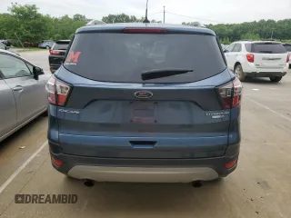 2018 Ford Escape Titanium with VIN 1FMCU9J93JUC01903, listed as a Copart auction lot 57337045 with 59,276 mi miles and Salvage title. Bid and sale history available at DreamBid. Image 6.