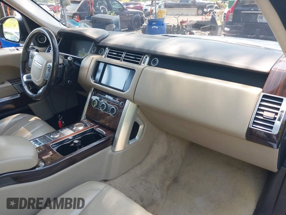 2015 Land Rover Range Rover Supercharged with VIN SALGS2TF3FA218272, listed as a IAAI auction lot 42463876 with 102,037 mi miles and . Bid and sale history available at DreamBid. Image 5.