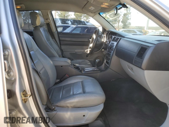 2006 Dodge Charger with VIN 2B3KA43G56H390329, listed as a Copart auction lot 46658235 with 252,522 mi miles and Salvage Title. Bid and sale history available at DreamBid. Image 7.