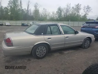 2006 Mercury Grand Marquis GS z VIN 2MEFM74W76X612565, wystawiony jako Copart lot #57940505 z przebiegiem 87 690 mil mil oraz Tytuł czysty. Historia ofert i sprzedaży dostępna na DreamBid. Obrazek 3.