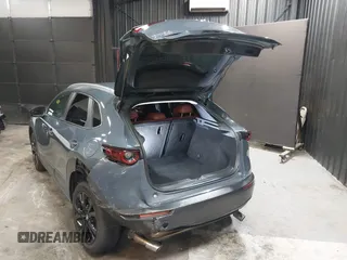 2022 Mazda CX-30 S Carbon Edition with VIN 3MVDMBCL8NM447234, listed as a IAAI auction lot 42511600 with 51,926 mi miles and . Bid and sale history available at DreamBid. Image 3.