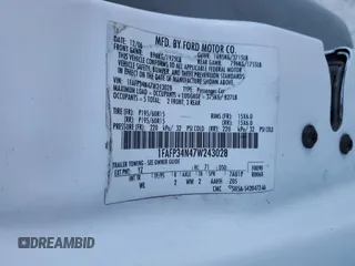 2007 Ford Focus S with VIN 1FAFP34N47W243028, listed as a Copart auction lot 55147695 with 218,672 mi miles and Salvage title. Bid and sale history available at DreamBid. Image 12.