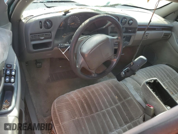 1998 Chevrolet Lumina LS with VIN 2G1WL52M2W1137056, listed as a Copart auction lot 74222044 with 179,699 mi miles and Salvage Title. Bid and sale history available at DreamBid. Image 8.