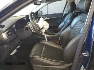 2021 Genesis G70 2.0T with VIN KMTG34LA0MU072088, listed as a Copart auction lot 57433985 with 77,876 mi miles and Clean title. Bid and sale history available at DreamBid. Image 7.