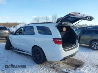 2023 Dodge Durango SRT 392 Premium with VIN 1C4SDJGJ3PC668238, listed as a IAAI auction lot 41305050 with 5,099 mi miles and . Bid and sale history available at DreamBid. Image 3.