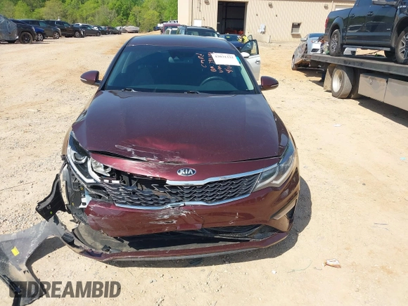 2020 Kia Optima LX with VIN 5XXGT4L3XLG451698, listed as a IAAI auction lot 42031333 with 68,714 mi miles and . Bid and sale history available at DreamBid. Image 13.