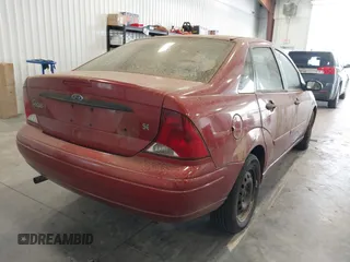 2004 Ford Focus with VIN 1FAHP34314W143472, listed as a IAAI auction lot 42192728 with 206,234 mi miles and . Bid and sale history available at DreamBid. Image 4.