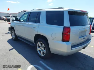 2015 Chevrolet Tahoe LTZ with VIN 1GNSCCKC3FR202934, listed as a IAAI auction lot 41995474 with 258,186 mi miles. Bid and sale history available at carsss.com. Image 3.