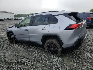 2023 Toyota RAV4 Hybrid SE with VIN JTM16RFV7PD100111, listed as a Copart auction lot 56682135 with 32,198 mi miles and Salvage title. Bid and sale history available at DreamBid. Image 2.
