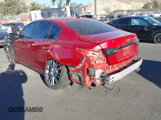 2021 Infiniti Q50 Red Sport 400 with VIN JN1FV7DP3MM850783, listed as a IAAI auction lot 41335175 with 59,113 mi miles and . Bid and sale history available at DreamBid. Image 3.