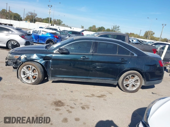 2014 Ford Taurus SEL z VIN 1FAHP2E84EG170133, wystawiony jako IAAI lot #41045369 z przebiegiem 261 732 mil mil oraz . Historia ofert i sprzedaży dostępna na DreamBid. Obrazek 15.