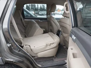 2009 Kia Borrego EX with VIN KNDJH741995015542, listed as a IAAI auction lot 42120069 with 139,457 mi miles. Bid and sale history available at carsss.com. Image 8.