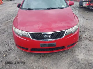 2013 Kia Forte EX with VIN KNAFU4A27D5729222, listed as a IAAI auction lot 42005687 with 124,785 mi miles. Bid and sale history available at carsss.com. Image 6.
