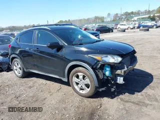 2016 Honda HR-V EX-L w/Navi with VIN 3CZRU6H71GM760696, listed as a IAAI auction lot 41830868 with 129,243 mi miles. Bid and sale history available at carsss.com. Image 1.