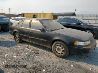 1992 Nissan Maxima z VIN JN1HJ01F1NT007180, wystawiony jako Copart lot #71271334 z przebiegiem 252 299 mil mil oraz Tytuł czysty. Historia ofert i sprzedaży dostępna na DreamBid. Obrazek 4.