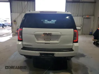 2016 GMC Yukon SLT with VIN 1GKS1BKC5GR450147, listed as a Copart auction lot 51058805 with 163,944 mi miles and Salvage Title. Bid and sale history available at carsss.com. Image 6.