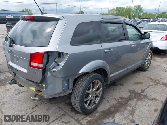 2015 Dodge Journey R/T with VIN 3C4PDCEG0FT679063, listed as a IAAI auction lot 42251861 with 138,258 mi miles and . Bid and sale history available at DreamBid. Image 4.