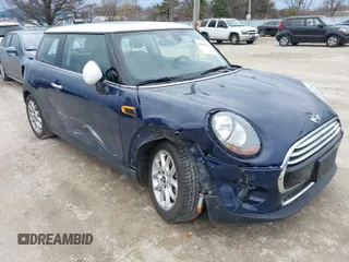 2017 MINI Hardtop Cooper with VIN WMWXP5C34H3B15966, listed as a IAAI auction lot 41889565 with 21,579 mi miles and . Bid and sale history available at DreamBid. Image 1.