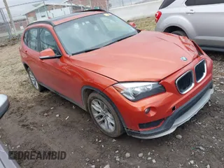 2015 BMW X1 xDrive28i with VIN WBAVL1C50FVY41206, listed as a IAAI auction lot 41508136 with 102,725 mi miles. Bid and sale history available at carsss.com. Image 1.