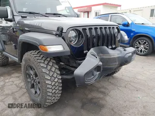 2022 Jeep Wrangler Willys Sport with VIN 1C4GJXAN7NW252931, listed as a IAAI auction lot 40972143 with 12,823 mi miles and . Bid and sale history available at DreamBid. Image 6.