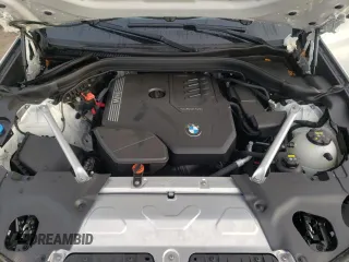 2022 BMW X4 xDrive30i z VIN 5UX33DT02N9M03597, wystawiony jako Copart lot #68990052 z przebiegiem Nie podano mil oraz . Historia ofert i sprzedaży dostępna na DreamBid. Obrazek 13.