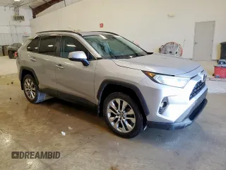 2021 Toyota RAV4 XLE Premium with VIN 2T3C1RFV7MC132953, listed as a Copart auction lot 60598085 with 111,013 mi miles and Clean title. Bid and sale history available at DreamBid. Image 4.