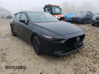 2021 Mazda Mazda3 Hatchback Premium with VIN JM1BPBML4M1402317, listed as a Copart auction lot 64393482 with 8,016 mi miles. Bid and sale history available at carsss.com. Image 1.