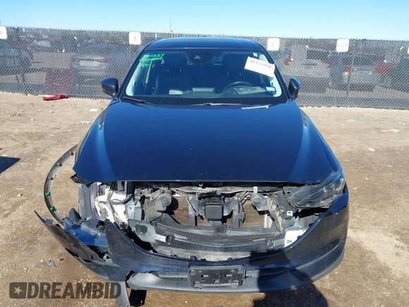 2019 Mazda CX-5 Grand Touring with VIN JM3KFBDM2K1685168, listed as a IAAI auction lot 41323598 with 88,429 mi miles. Bid and sale history available at carsss.com. Image 12.