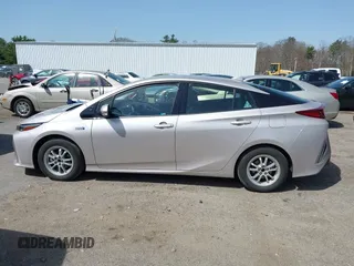 2018 Toyota Prius Plus with VIN JTDKARFP5J3091877, listed as a IAAI auction lot 42129355 with 48,736 mi miles and . Bid and sale history available at DreamBid. Image 14.