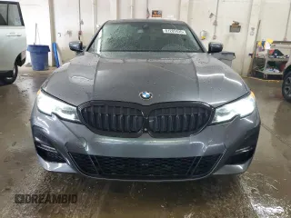2019 BMW 3 Series 330i xDrive with VIN WBA5R7C57KAJ86027, listed as a Copart auction lot 61203435 with 41,486 mi miles and Salvage title. Bid and sale history available at DreamBid. Image 5.