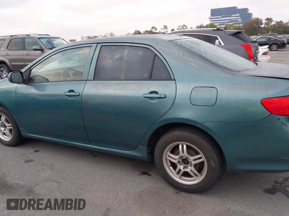2009 Toyota Corolla with VIN 1NXBU40E39Z047881, listed as a IAAI auction lot 42078719 with 204,258 mi miles. Bid and sale history available at carsss.com. Image 14.