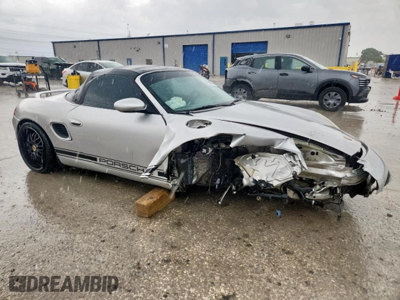 2002 Porsche Boxster S with VIN WP0CB29802S660218, listed as a Copart auction lot 62540525 with 129,940 mi miles and Salvage title. Bid and sale history available at DreamBid. Image 4.
