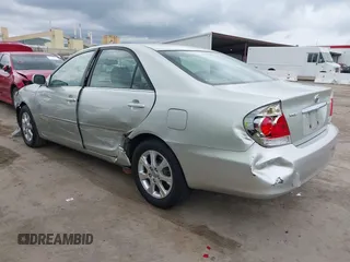2005 Toyota Camry LE with VIN JTDBF30K650163057, listed as a IAAI auction lot 41730270 with 98,300 mi miles and . Bid and sale history available at DreamBid. Image 3.