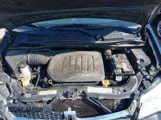 2012 Dodge Grand Caravan SXT with VIN 2C4RDGCG2CR319651, listed as a IAAI auction lot 42097594 with 155,521 mi miles and . Bid and sale history available at DreamBid. Image 10.
