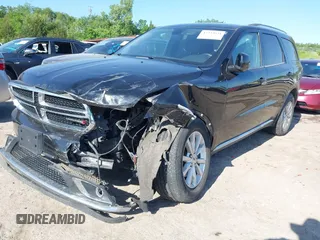 2019 Dodge Durango SXT Plus with VIN 1C4RDJAG7KC585514, listed as a IAAI auction lot 42233631 with 135,496 mi miles and . Bid and sale history available at DreamBid. Image 19.