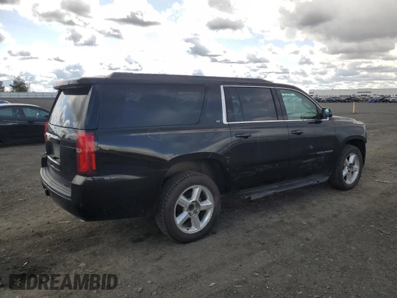 2018 Chevrolet Suburban LT with VIN 1GNSKHKC0JR266132, listed as a Copart auction lot 51337275 with 197,386 mi miles and Salvage Title. Bid and sale history available at DreamBid. Image 3.
